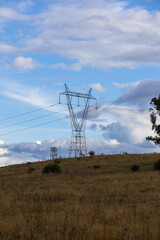 Power line in the middle of the field.