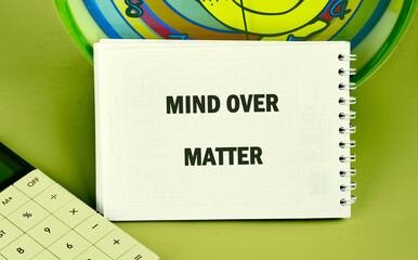 The conceptual phrase MIND OVER MATTER. The concept of beauty and health. Business and Keep an open...