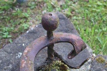 Vintage old black wrought-iron openwork railing staircase or fence. The fragment part. 