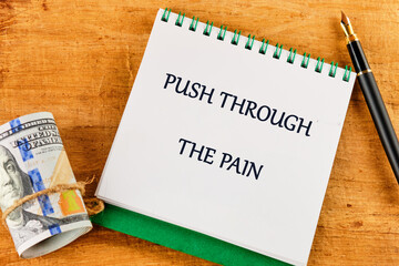 Despite discomfort concept. Words PUSH THROUGH THE PAIN