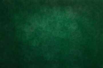 Christmas Dark Green Bokeh Background. Festive dark green bokeh background. Perfect for New Year sales designs, holiday cards, or winter-themed projects.