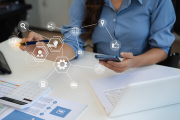 Business woman or financial data analysts working with alculator and laptop computers and data...