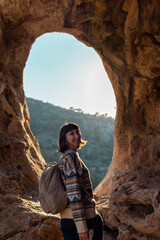 follow me. happy couple traveling. portrait of happy female tourist in mountains. girl smiling. trekking and hiking. girl with backpack.
