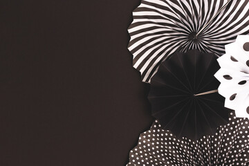 Black and white paper fans with place for your design. Festive monochrome concept.