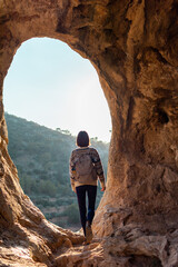 happy woman in mountains. girl traveling in mountains. trekking and hiking. girl with backpack.