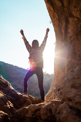 happy woman in mountains. girl traveling in mountains. trekking and hiking. girl with backpack.