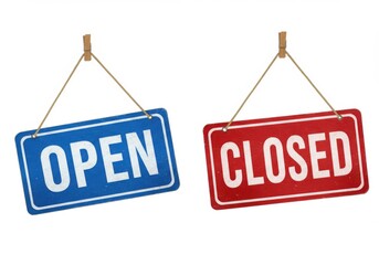 A pair of signs displaying the words open and closed against a plain backdrop