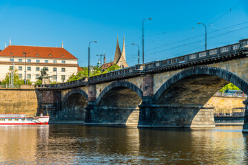 A view from the Vltava river towards the Palacke bridge in Prague in springtime
