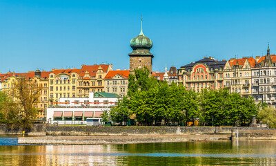 A view from the Vltava river towards the east bank and the Legion Park in Prague in springtime