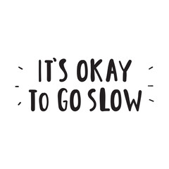 Motivational phrase - it's okay to go slow. Vector graphic design. Handwriting inscription on white background.