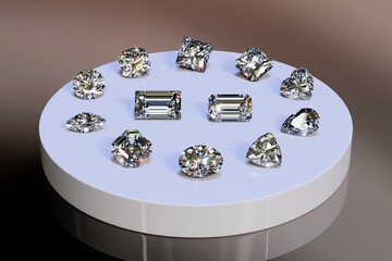 Variously cut diamonds: round brilliant, cushion, heart, asscher, radiant, emerald, baguette, oval, pear, marquise, trilliant, on white tray on brown background.