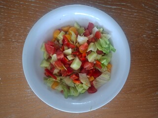 fresh salad with tomatoes and cucumbers