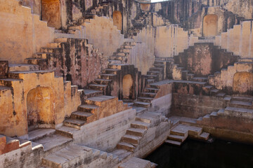The mesmerizing geometric patterns of a historic Indian stepwell, with countless ancient stairs...