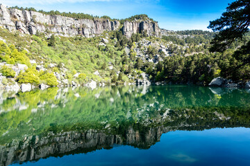 Dramatic Cliffs Reflected in Laguna Negra de Urbion, Soria, Castile and Leon, Spain