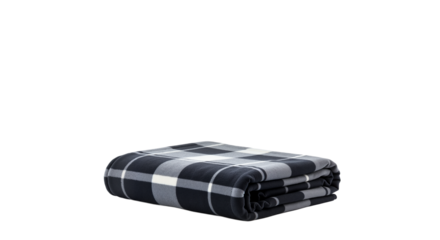 Folded black and white checkered blanket on plain background. Isolated image on a transparent background. The concept of travel. 