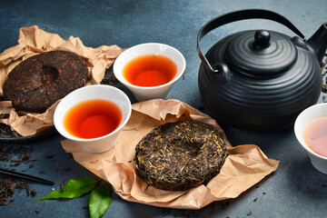 Tea background. dry pressed pu erh tea. Tea ceremony and tea preparation.