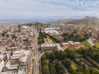 Ediburgh Scotland: 18th May 2025: Edinburgh Skyline and Edinburgh Waverley station area showcasing the historic skyline and surrounding hills and a cloudy overcast day