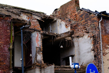 Leeds England: 3rd June 2024:  Structural remnants of an old building in Leeds showcase extensive damage and decay. Exposed bricks and broken beams highlight the neglect and age of the structure