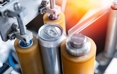 Modern beer production, automated can filling in brewery factory setting label application process