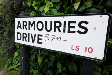 Leeds England: 3rd June 2024:  The sign for Armouries Drive in Leeds and the postal code LS10