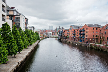 Leeds England: 3rd June 2024: Scenic River Aire flows through leeds city centre