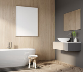 Contemporary bathroom with blank frame mockup, wall-mounted vanity, and freestanding tub – modern wood and gray accent JPG