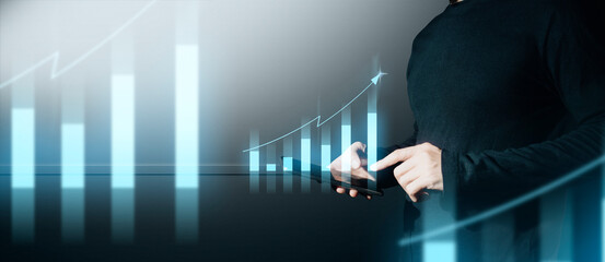 hand of businessman interactive touching a holographic of transaction financial network data...