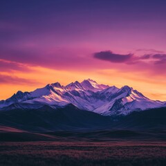 Majestic Sunset Over Snow-Capped Mountains in Wilderness Landscape