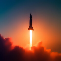 Dramatic silhouette of a rocket launching at sunrise, silhouetted against vibrant orange and blue skies.