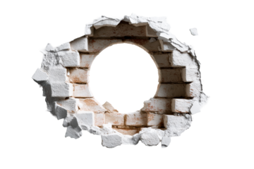 Broken wall revealing circular opening in white brick structure