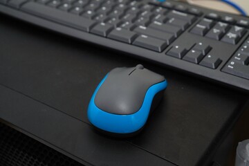 computer mouse and keyboard on black table