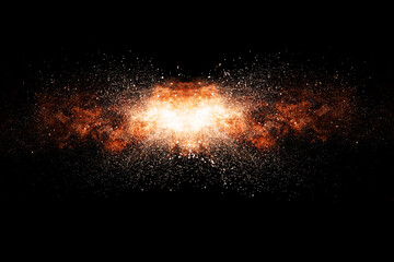 Abstract orange powder explosion isolated on black background	