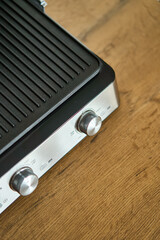 This electric grill has a nonstick surface and adjustable temperature controls for your convenience