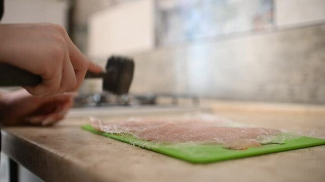 Cooking Breast Chicken Meat, Beat Chicken using Meat Tenderizer. Cooking Process in The Kitchen.