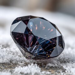 Sparkling dark gemstone resting on a bed of frost in a winter setting illuminated by soft sunlight
