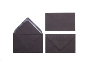 Three black envelopes on a white background with copy space