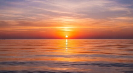 Obraz premium A serene sunset over the ocean with vibrant colors reflecting on the calm water surface view scene