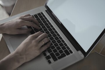 Executive using laptop in office