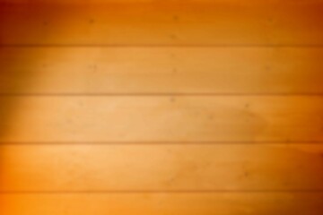 Wooden planks are appearing blurred in flat design, showing warm orange gradient, copy space