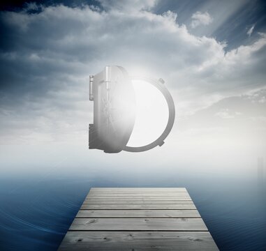 Fototapeta Shiny open safe in sky over ocean