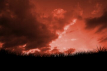 Silhouette of field against sky