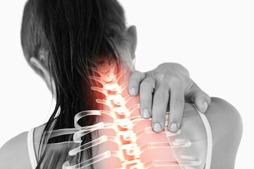 Highlighted spine of woman with neck pain