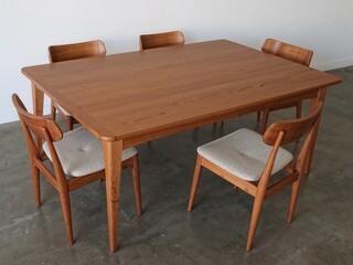 Polished teak dining set with minimalist 60s Scandinavian feel