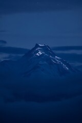Majestic Mountain Peak at Twilight A Stunning Nighttime Landscape Illustration