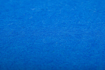 Blue felt texture background - close-up of soft fabric surface. Seamless background, graphic...