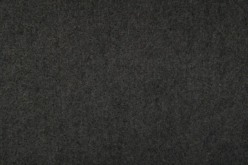 Dark gray felt texture background - close-up of soft fabric surface. Seamless background, graphic design, scrapbooking, textile layouts, creative projects.