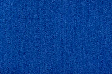 Dark blue felt texture background - close-up of soft fabric surface. Seamless background, graphic design, scrapbooking, textile layouts, creative projects.