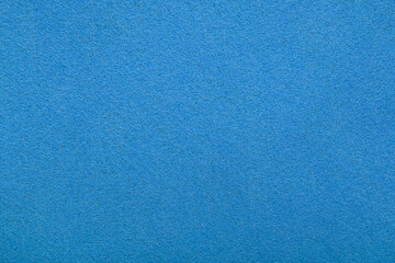 Light blue felt texture background - close-up of soft fabric surface. Seamless background, graphic design, scrapbooking, textile layouts, creative projects.