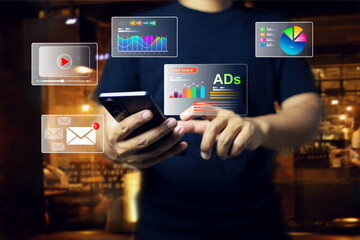 Digital marketing advertisement concept with a man receive advertising information by smart phone in customer relation ship engagement on marketing platform