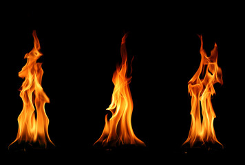 Abstract flame isolated on black background. Different burning effects. Flames in the night sky.
